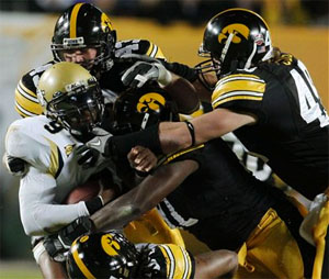 Iowa wins Orange Bowl